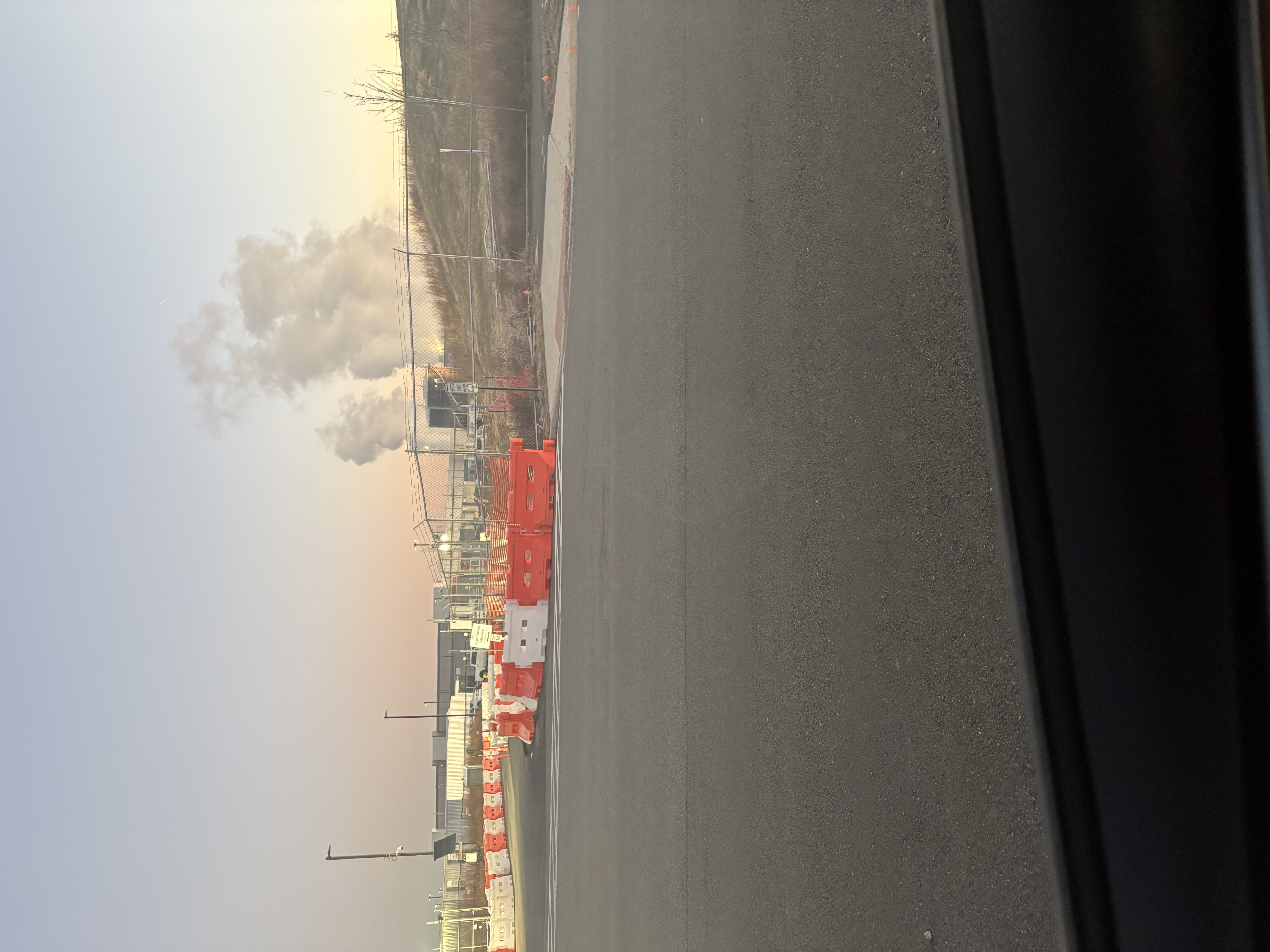 Daytime view of data center cooling steam plumes